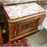 An early 20th century French marble topped carved walnut low cabinet, length 64cm, depth 35cm,