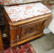 An early 20th century French marble topped carved walnut low cabinet, length 64cm, depth 35cm,
