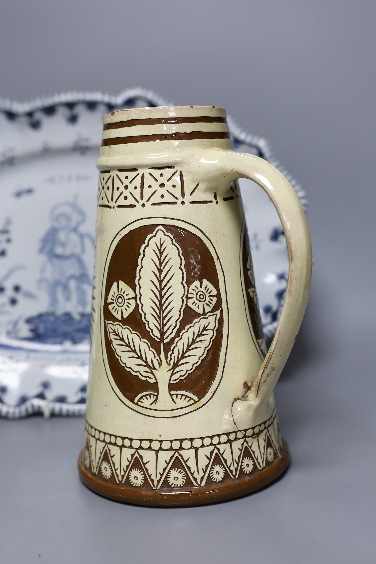 A Brannum sgraffito jug and a French faience serving dish, 42cm - Image 4 of 6