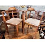 A pair of Edwardian inlaid mahogany corner elbow chairs