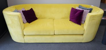A contemporary Conran tub framed settee, upholstered in Italian Wattle velvet, with up to date