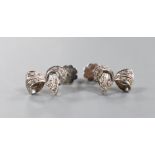 A modern pair of 18ct white gold and diamond chip set scroll earrings, 17mm, gross weight 6.8