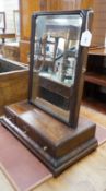 An 18th century mahogany box based toilet mirror, with bevelled plate and three base drawers, on