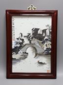 A Chinese porcelain plaque, decorated with a river scene, 34x23cm excl frame