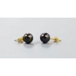 A pair of 18ct and cultured Tahitian pearl set ear studs.