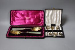 A cased pair of Victorian bowenite handled silver serving spoons, Edinburgh, 1888 and a cased set of
