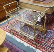 A brass and glass two tier tea trolley, width 84cm, depth 42cm, height 73cm