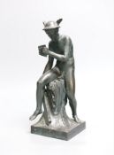 After the antique, a bronze figure of a seated Hermes playing the pan flute, 26cm