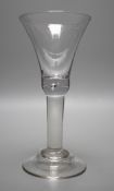 A George II glass goblet, domed foot, 19cm tall