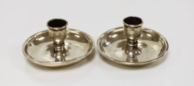 A pair of 19th century silver plated 'Brighton Bun' travelling candlesticks, diameter 85mm.