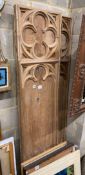 A pair of carved Gothic style wall panels, each width 45cm, height 198cm