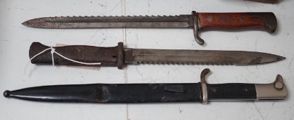 Three German bayonets including two saw-back pioneers