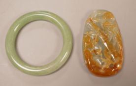 A Chinese jadeite plaque and an aventurine quartz bangle