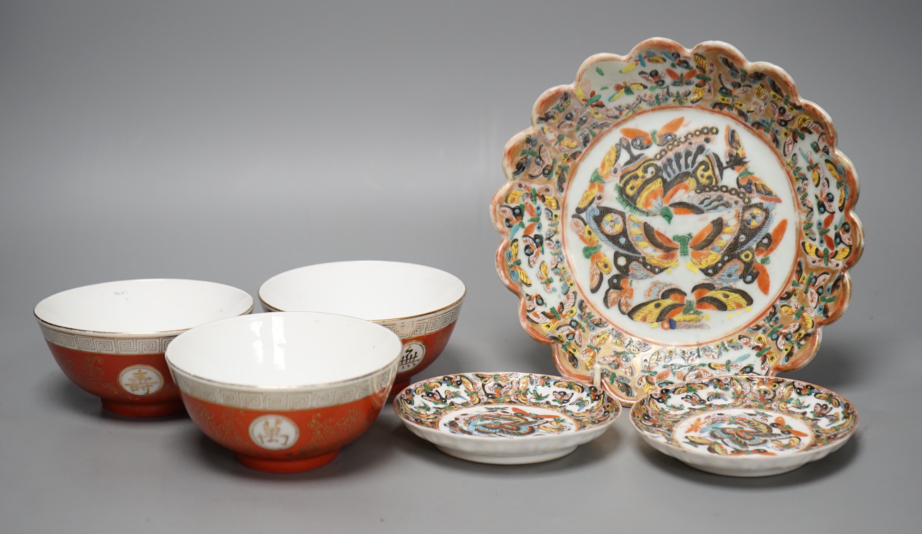 A Chinese 'thousand butterfly' dish and two saucers, early 20th century and three later Chinese