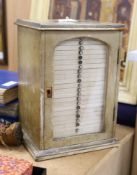 A collection of approximately 200 Victorian and later microscope slides in late 19th century cabinet