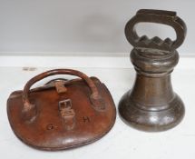 A single Victorian inscribed weight, together with quoits in brown leather case initialled G.H.