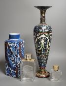 A Royal Copenhagen faience vase and a grotesque style bottle vase and two Lalique pour Homme perfume
