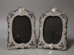 A pair of Edwardian repousse silver mounted photograph frames, by Robert Chandler, Birmingham, 1901,