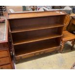 A 19th century slender mahogany graduated dwarf open bookcase, width 108cm, depth 26cm, height 99cm