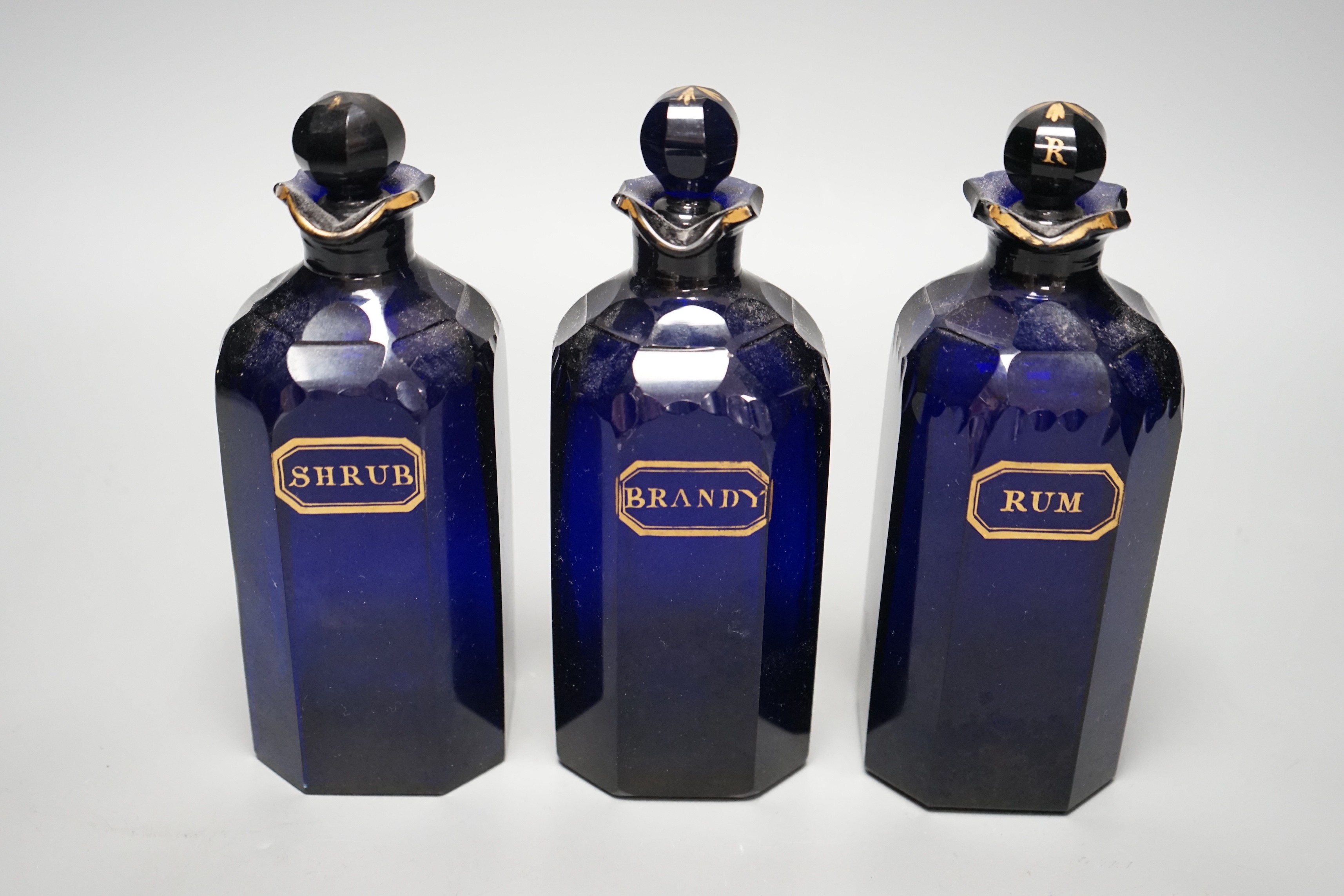Three Georgian Bristol Blue gilt labelled decanters, ‘rum’, ‘brandy’ and ‘shrub’ 20cm - Image 2 of 4