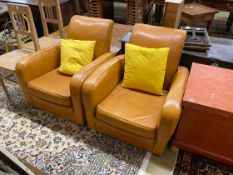 A pair of Art Deco style tan leather club armchairs, width 76cm, depth 80cm, height 78cm