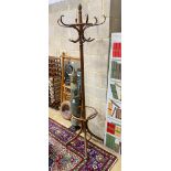 A large stained beech bentwood coat stand, height 192cm