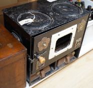 A Rippingilles paraffin stove, 44cms wide x 39cms high
