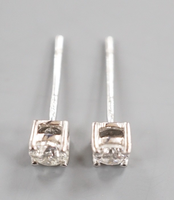 A modern pair of 9ct white gold and solitaire diamond set ear studs, gross 0.8 grams, total - Image 3 of 4