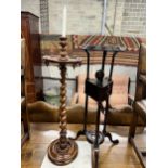 An early 20th century carved oak candle stand together with a mahogany washstand, larger height