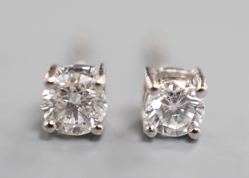 A modern pair of 9ct white gold and solitaire diamond set ear studs, gross 0.8 grams, total - Image 2 of 4