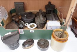 A good collection of tin plated iron jelly moulds, pastry moulds and kitchenalia