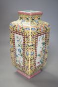 A Chinese yellow ground square floral vase, 27cm tall