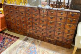 A 19th century mahogany and pine 66 drawer apothecary chest with turned wood handles and some