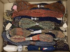 Twenty mixed 19th century cut steel and knitted misers purses
