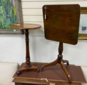 An early 19th century mahogany tilt top tripod wine table and a Victorian circular wine table,