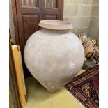 A larger circular earthenware garden urn, height 94cm