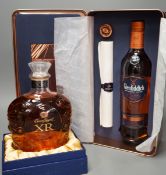 A tin of Anniversary Edition Glenfiddich and a box of Crown Royal Extra Rare Whiskey (2)
