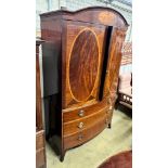 A George IV satinwood banded mahogany bow front linen press, adapted, width 130cm, depth 60cm,