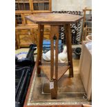 A Liberty style hexagonal oak occasional table, width 39cm, height 71cm