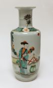 A Chinese famille verte rouleau vase depicting figures in landscape, 22.5cm tall