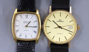 A gentleman's modern gold plated? Garrard quartz wrist watch and a similar steel and gold plated