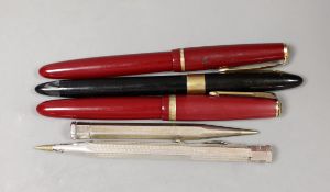 Two Parker fountain pens including Junior and three other pens or pencils including two silver