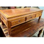 A Chinese rectangular hardwood three drawer coffee table, width 127cm, depth 50cm, height 40cm