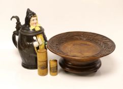 A continental figural lidded jug a carved treen comport and two Mauchline boxes, jug 21cms high