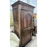 An 18th century French provincial fruitwood single door armoire, length 106cm, depth 62cm, height