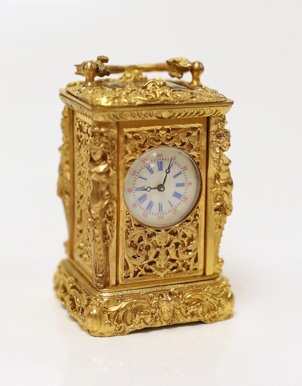 A miniature carriage timepiece, 7cms high