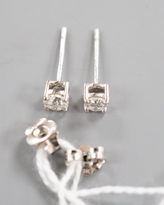 A modern pair of 9ct white gold and solitaire diamond set ear studs, gross 0.8 grams, total - Image 4 of 4