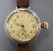 A gentleman's early 20th century silver manual wind wrist watch with Zenith movement, on
