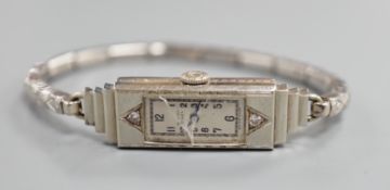 A lady's white metal and two stone diamond set C.R. Bucherer's Rolex Princess manual wind cocktail