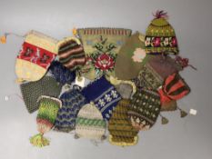 Sixteen mixed 19th century knitted and crochet purses, misers purses, reticules and a woven gilt
